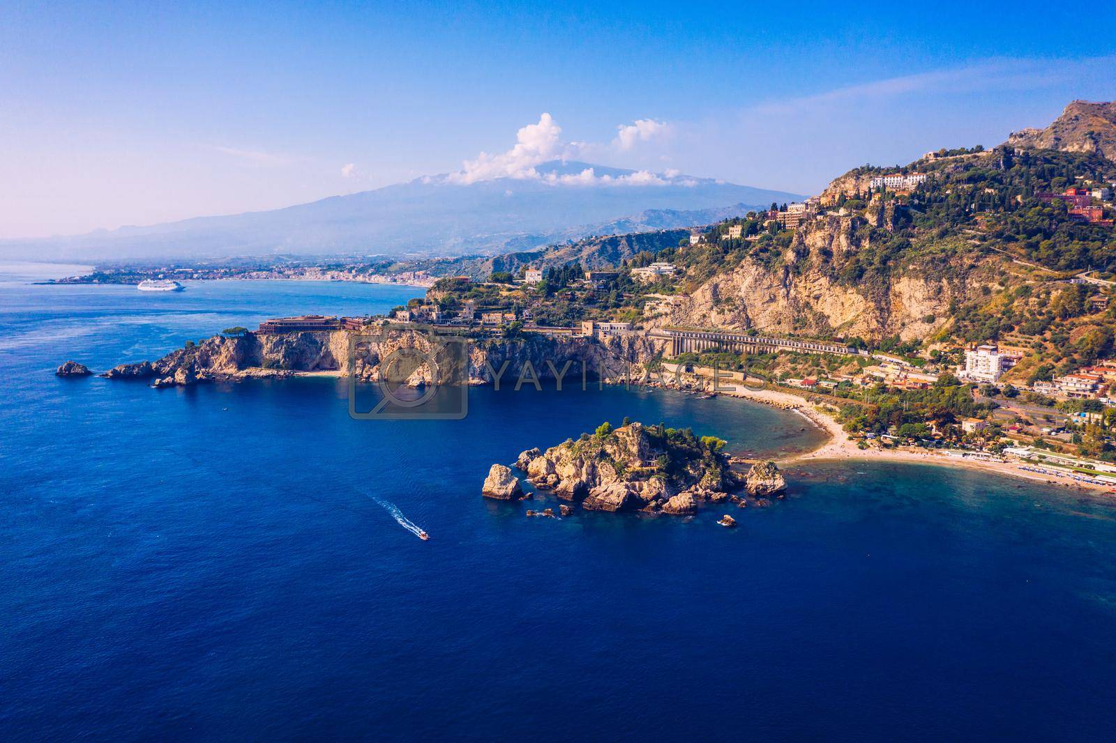 Royalty free image of Aerial view of Isola Bella in Taormina, Sicily, Italy. Isola Bella is small island near Taormina, Sicily, Italy. Narrow path connects island to mainland Taormina beach in azure waters of Ionian Sea.  by DaLiu
