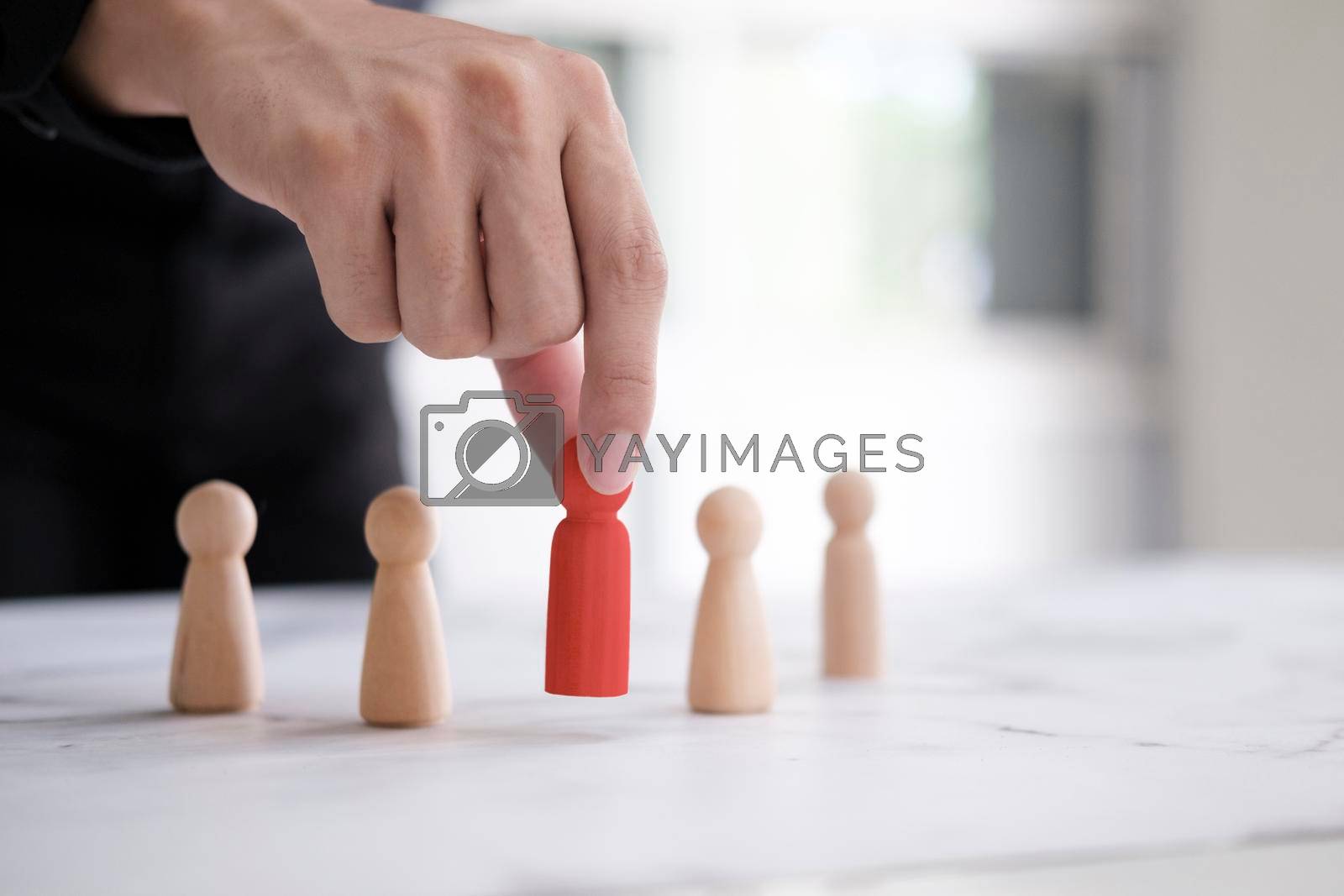 Royalty free image of Employer chooses takes in hand employee. by ijeab