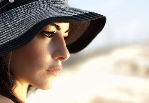 Attractive female wearing hat