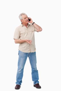Mature male talking on his cellphone