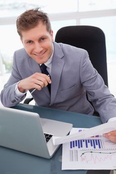 Businessman happy about market research results