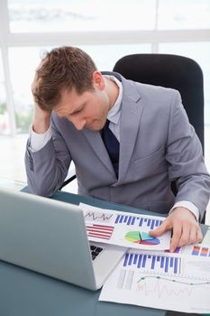 Businessman frustrated by market research results