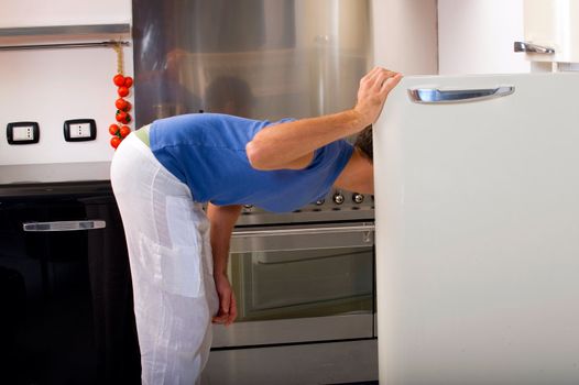 man opening the refrigerator