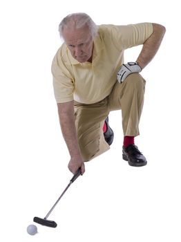 senior pushing the golf ball