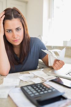 Young woman feeling financial pressure