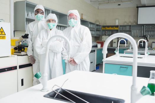 Three laboratory technicians