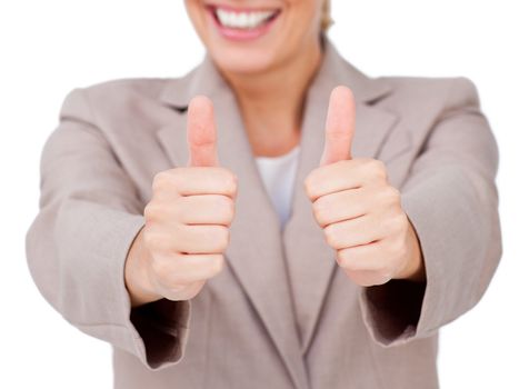 Fortunate businesswoman with thumbs up 