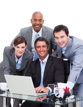 Ambitious business team working at a computer