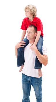 Lively little boy enjoying piggyback ride with his father
