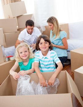 Lively family packing boxes