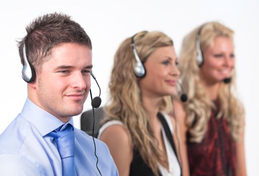 Three people in a call centre