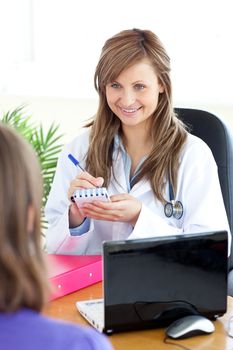 Happy female doctor doing a diagnosis 