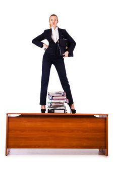 Dominant woman boss standing on desk