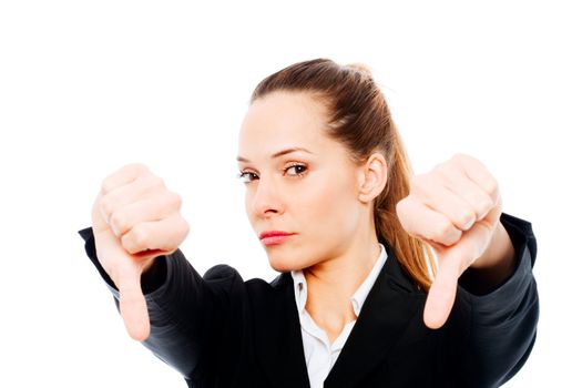 severe businesswoman with thumb down on white background studio