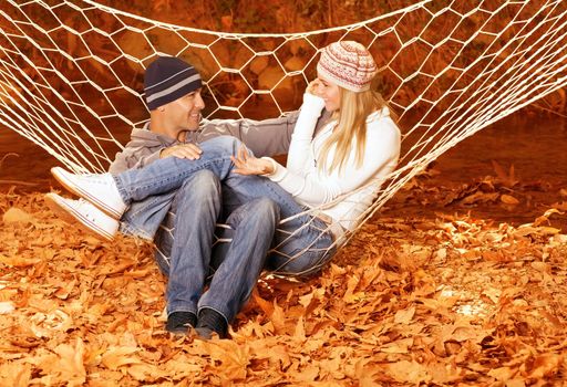 Couple talking in hammock