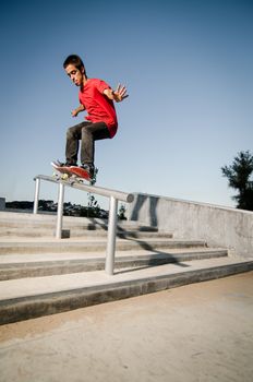 Skateboarder on rail 