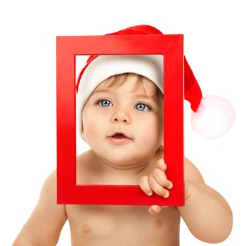 Child dressed in red Christmas hat
