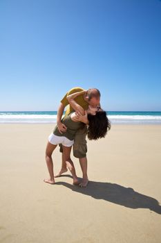 kissing couple at beach