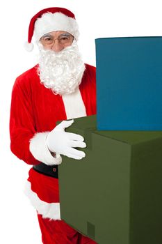 Photo of kind Santa Claus giving xmas presents