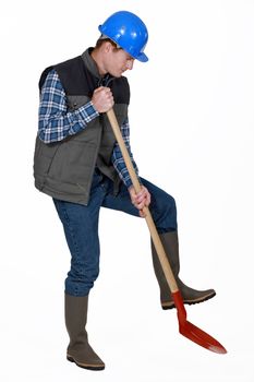 Labourer using a spade