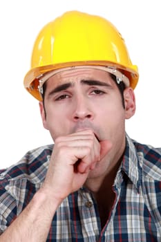 Construction worker yawning