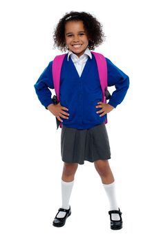 Primary school girl posing confidently