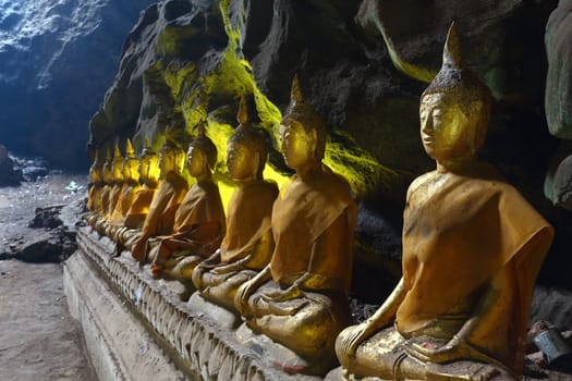 Buddha statue in a cave at Khao Luang temple