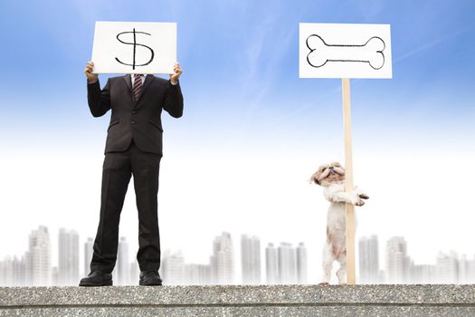 businessman showing the money sign and dog showing the bone