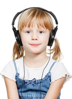 Little girl wearing headphones