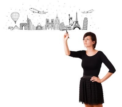Young woman drawing famous cities and landmarks on whiteboard 