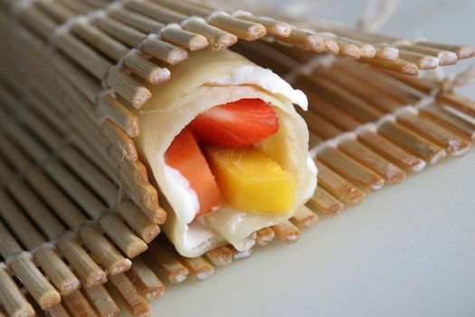 Rolled pancake with fruits