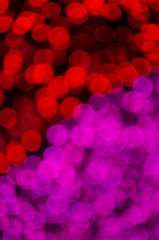 Abstract defocused pink and red lights background photo