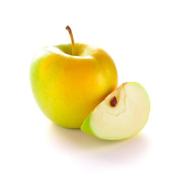 Yellow Apple with Apple Slice on the White Background