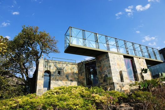 Modern villa made of stones and glasses