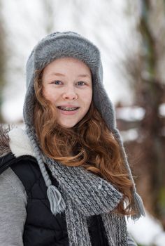 Teenager girl in a snowy park