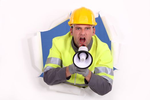 road worker yelling in a megaphone