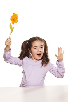 little girl and artificial flower