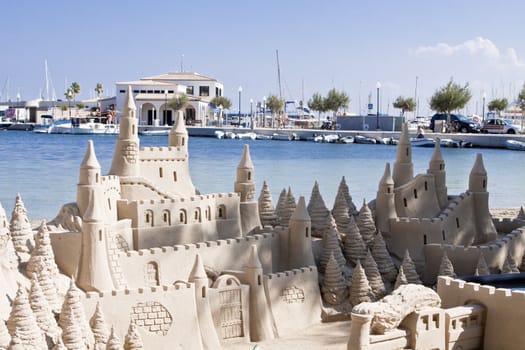 creative big sandcastle on the beauch in summer