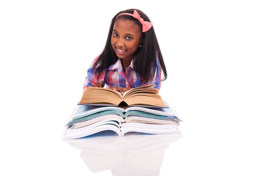 Little girl studying isolated on white background