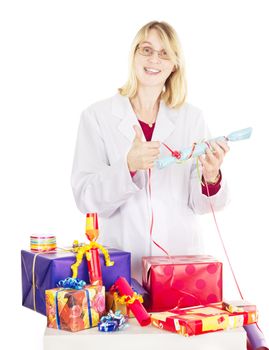 Person packaging some colorful gifts
