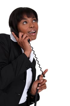 Smiling businesswoman on the phone