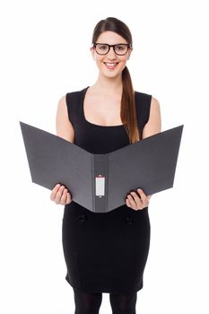 Business lady reviewing file she is holding