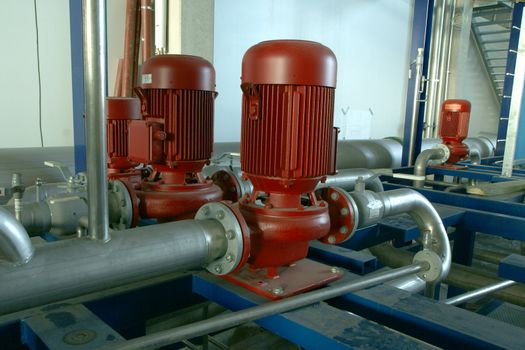 Industrial zone, Steel pipelines and pumps at factory