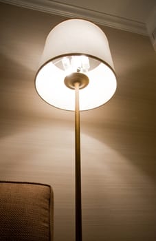 Lit lamp in a room