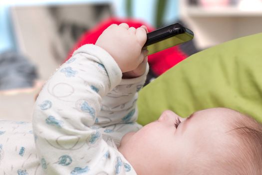 Baby with a mobile phone