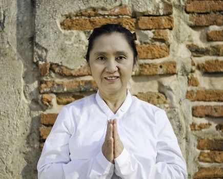 Thai woman with typical welcome expression 