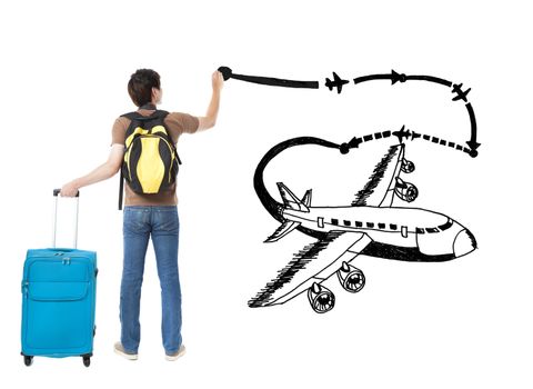 young traveler drawing airplane and airline path on the white ba