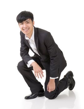 Asian business man squat