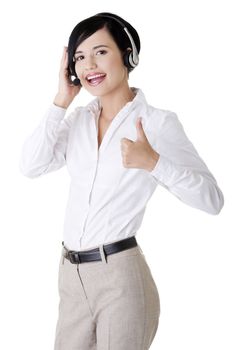 Pretty young call center worker wearing a headset