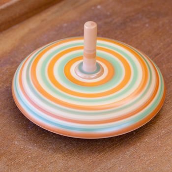 wooden spinning top at the fair